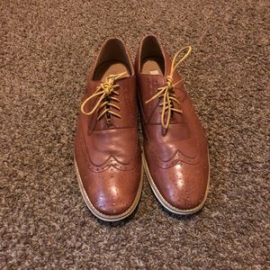 Steve Madden Tan and leather dress shoes.